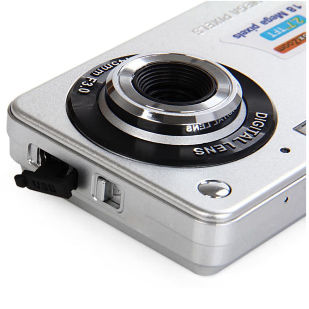 Side view showing the silver DC1109 digital camera, miniUSB port and macro switch